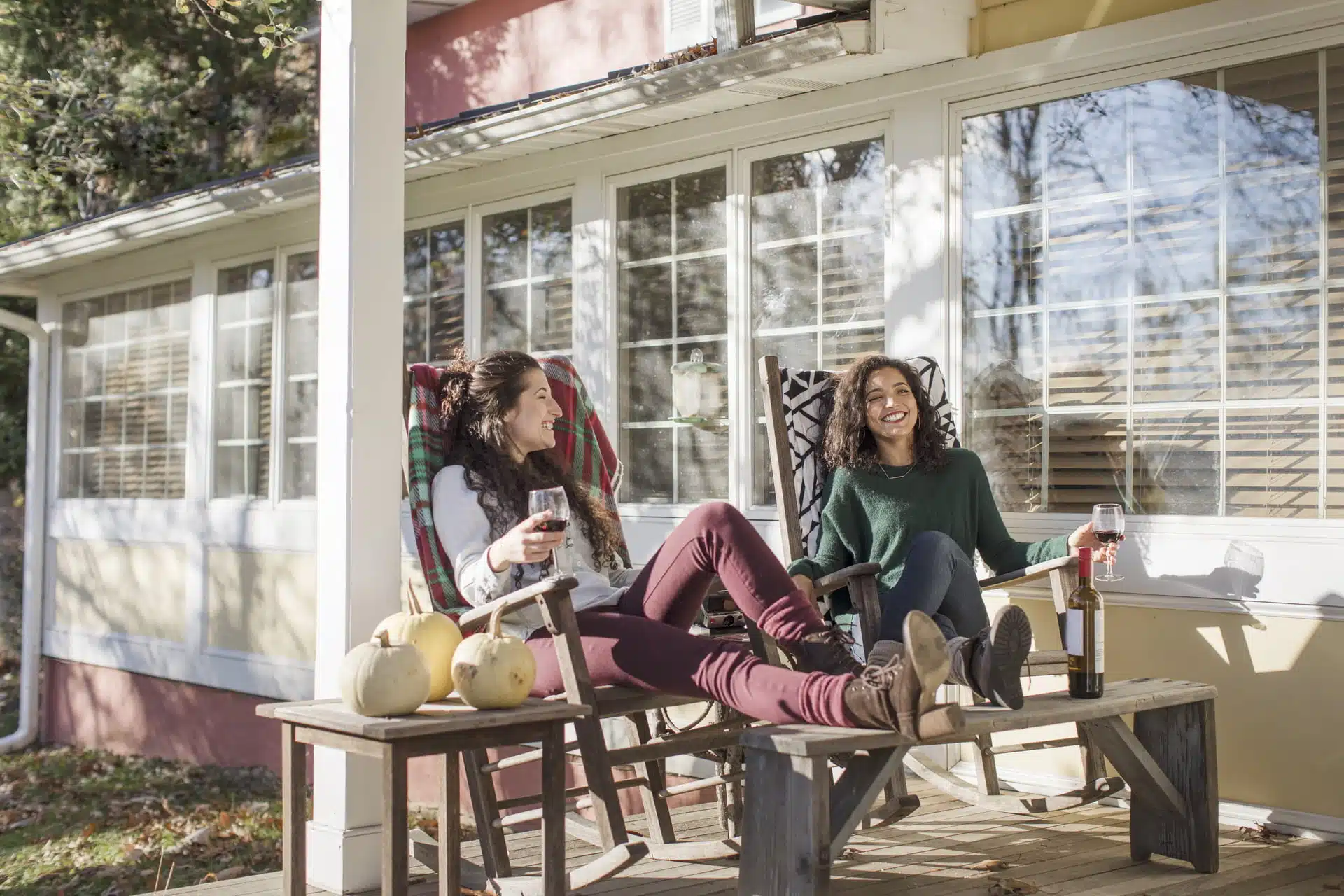 people relaxing under patio cover