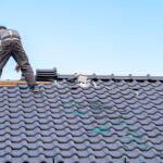 Roofer installing a new roof