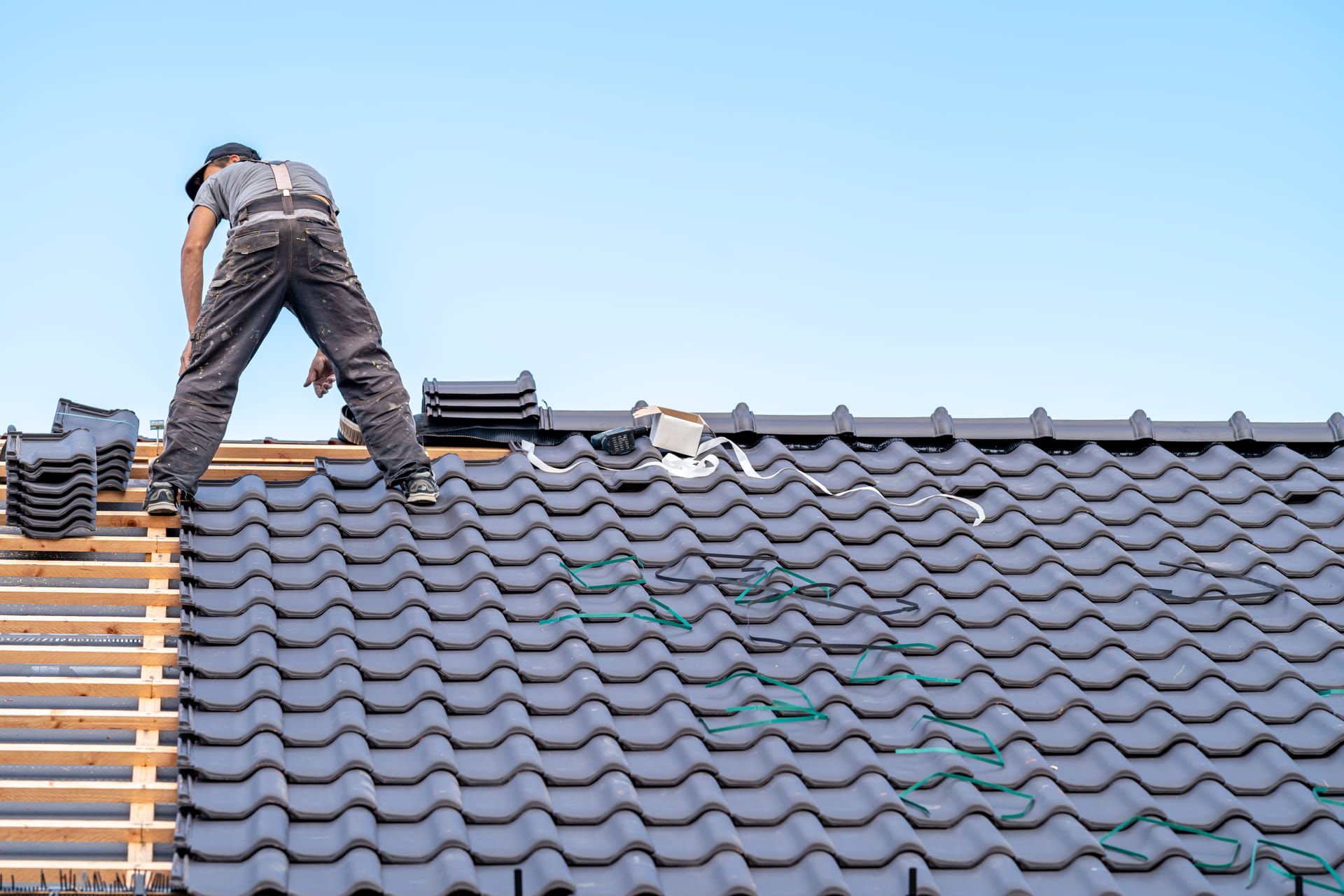 Roofer installing a new roof