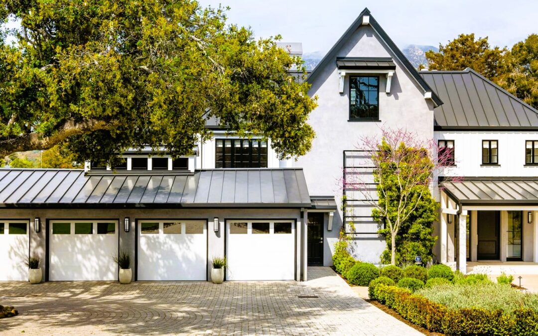 Grey house with a metal roof
