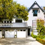 Grey house with a metal roof